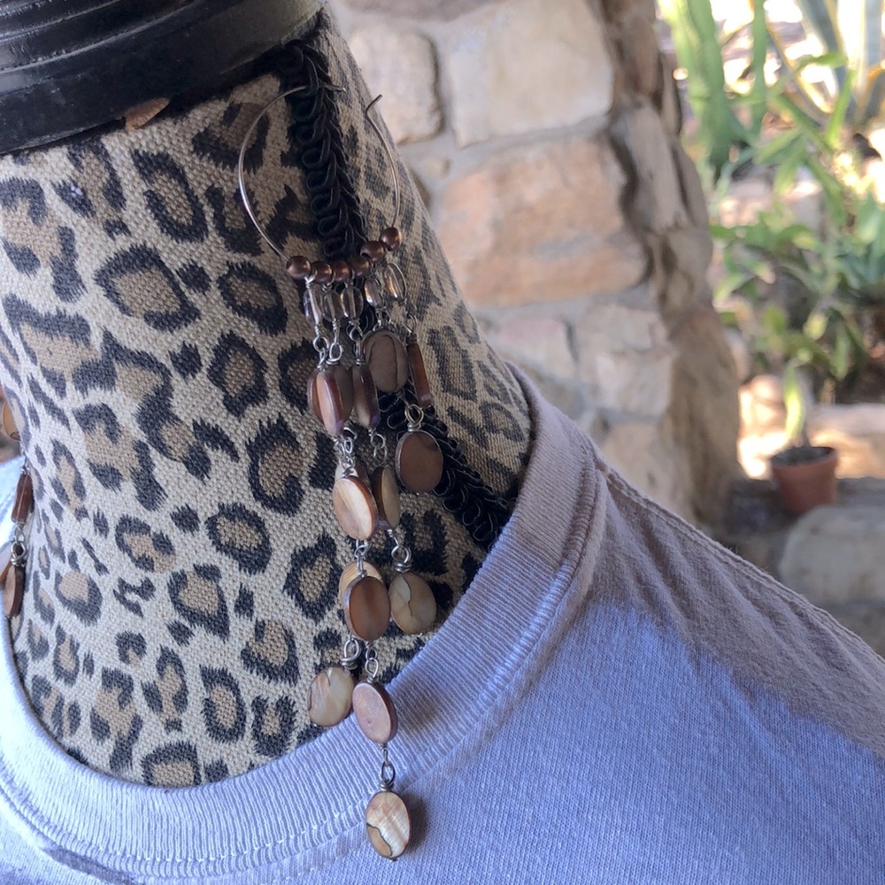 Abalone shell earring in tawny.